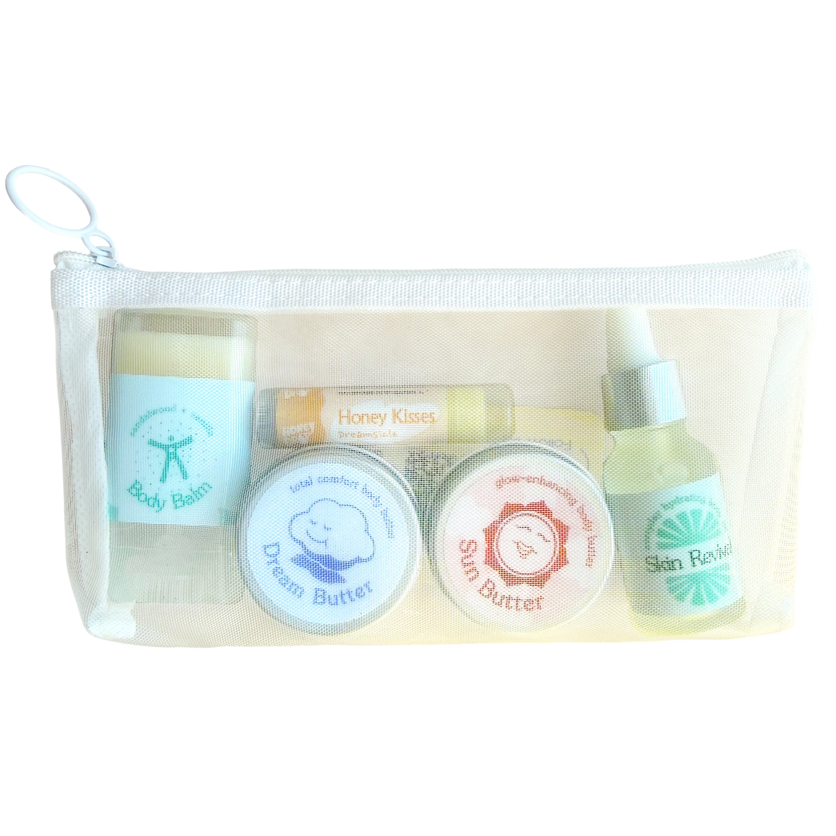 honeydrop mini essentials set is a three piece bodycare set including a lip balm, two mini body butters, mini body balm, and mini body oil in a white pouch