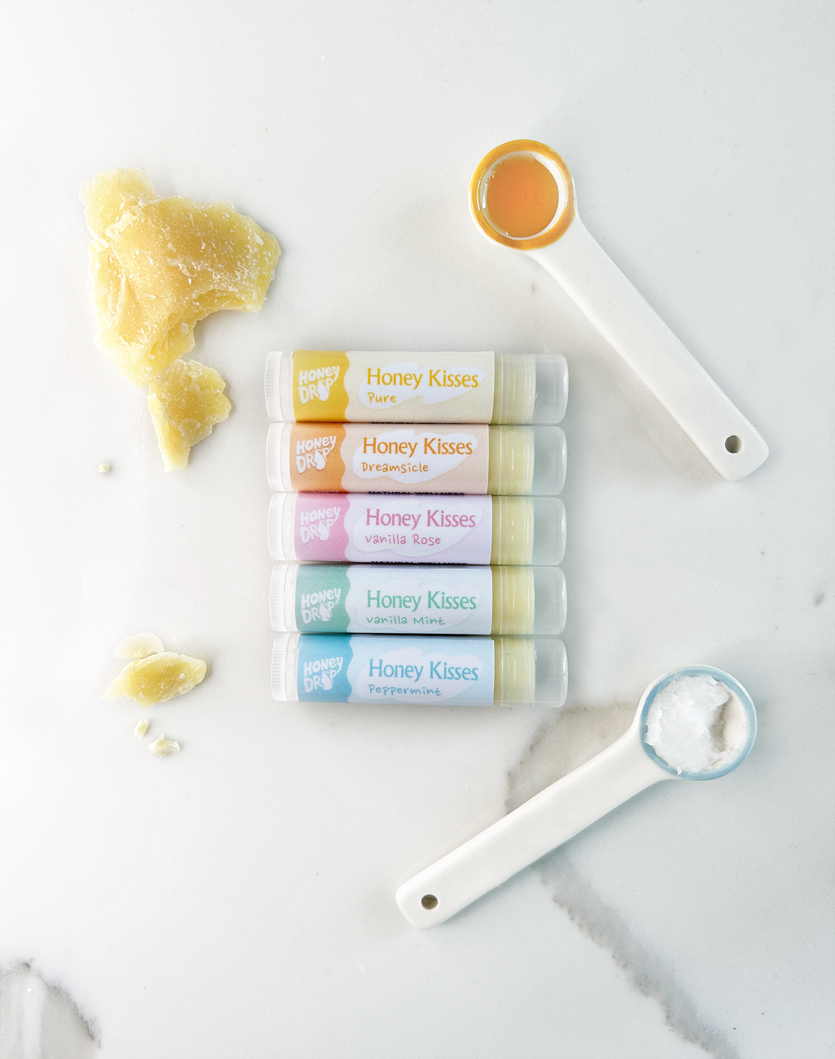 Honey Kisses Lip Balm tube, handmade with beeswax and coconut oil