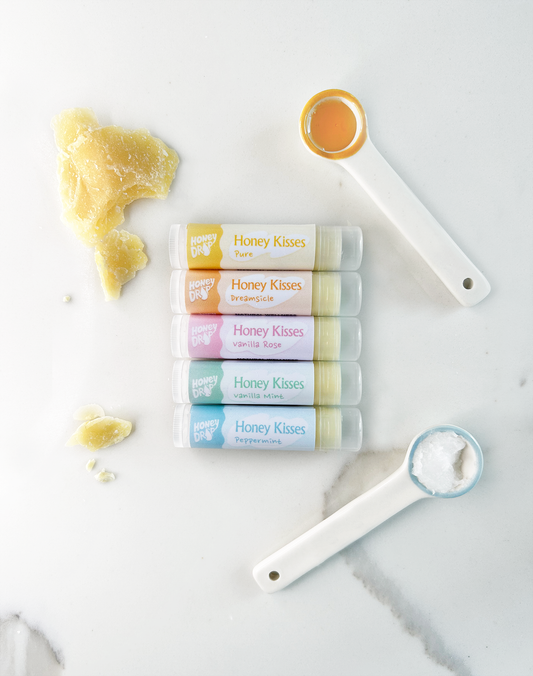 Honey Kisses Lip Balm tube, handmade with beeswax and coconut oil